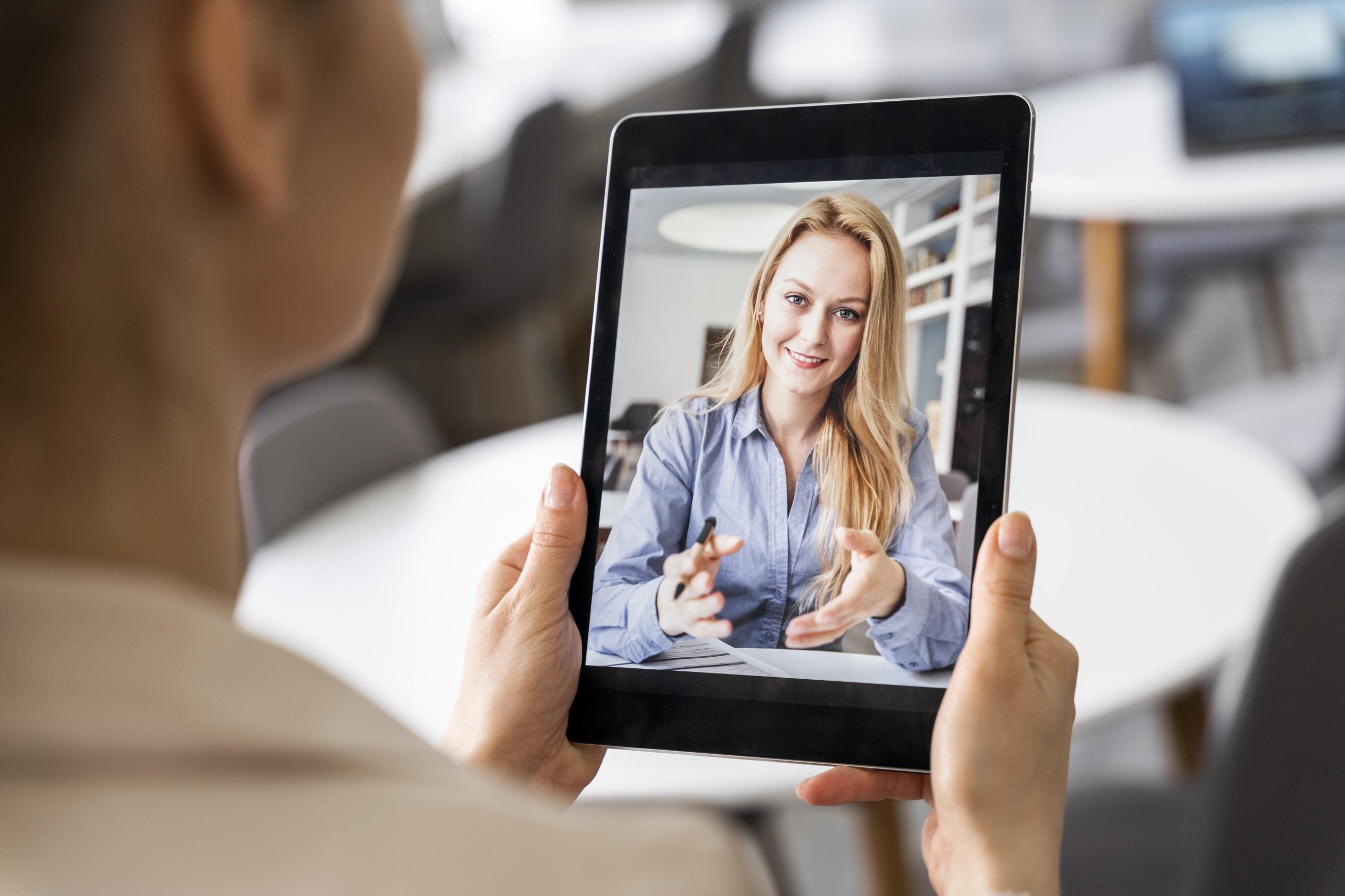 close-up-woman-holding-tablet